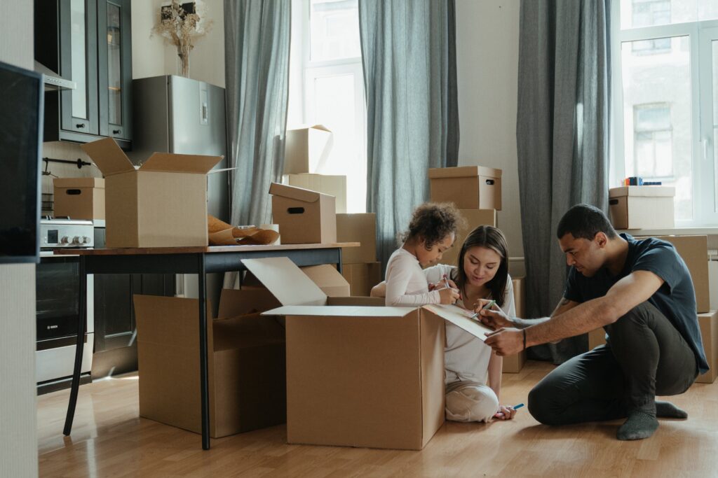 A family unpacking boxes in a new home